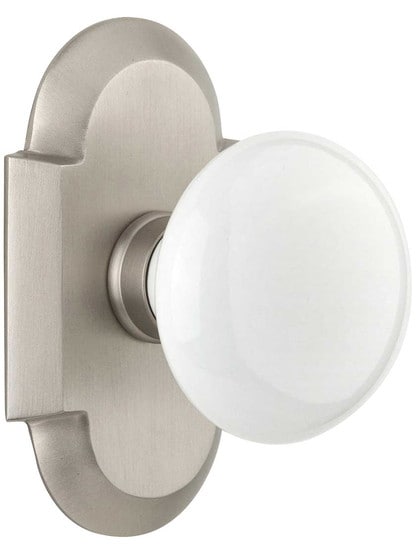 Arched Rosette Door Set with White Porcelain Knobs in Satin Nickel.